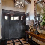 A beautiful lantern is a great choice for a foyer light. Home built by VII Custom Homes