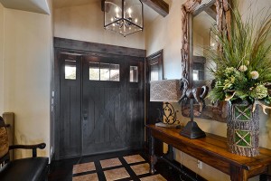 A beautiful lantern is a great choice for a foyer light. Home built by VII Custom Homes